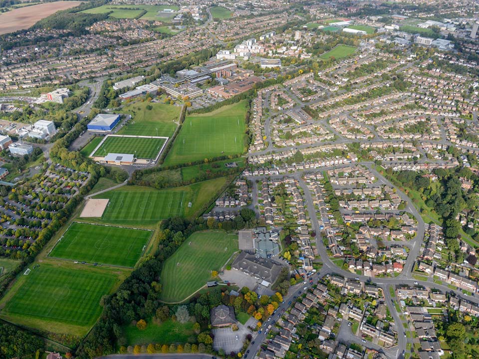 A number of pitches are pictures from the sky using a drone.