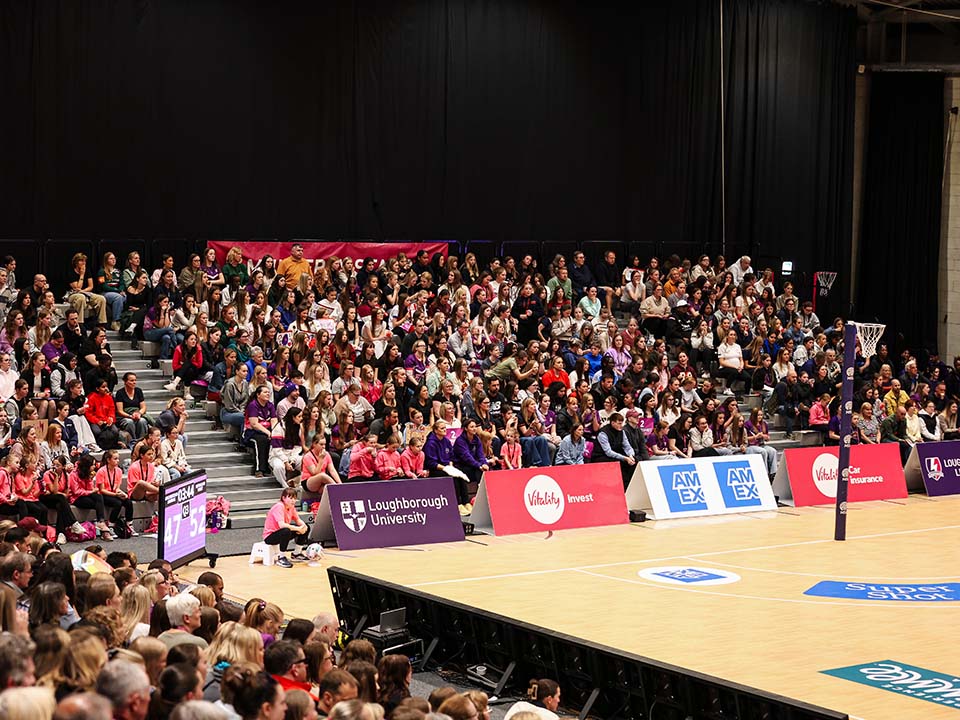 Set up for Lightning Netball, the sports hall has 1,500 spectators watching the game.