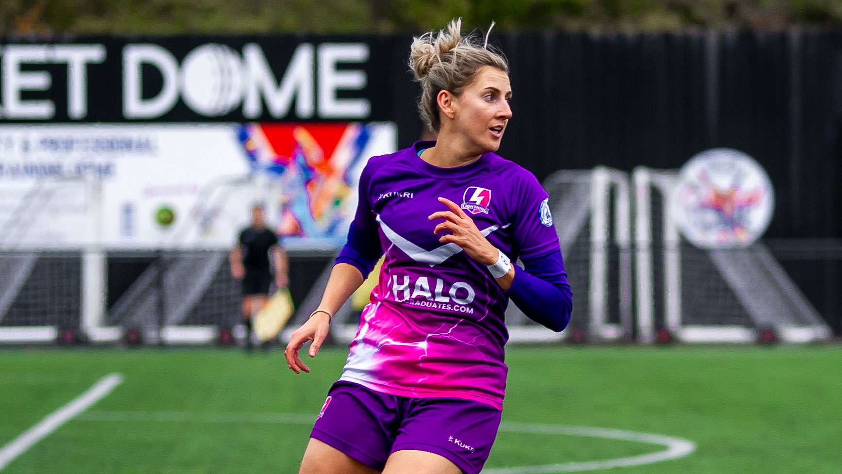 Georgia on pitch in a Lightning Football kit