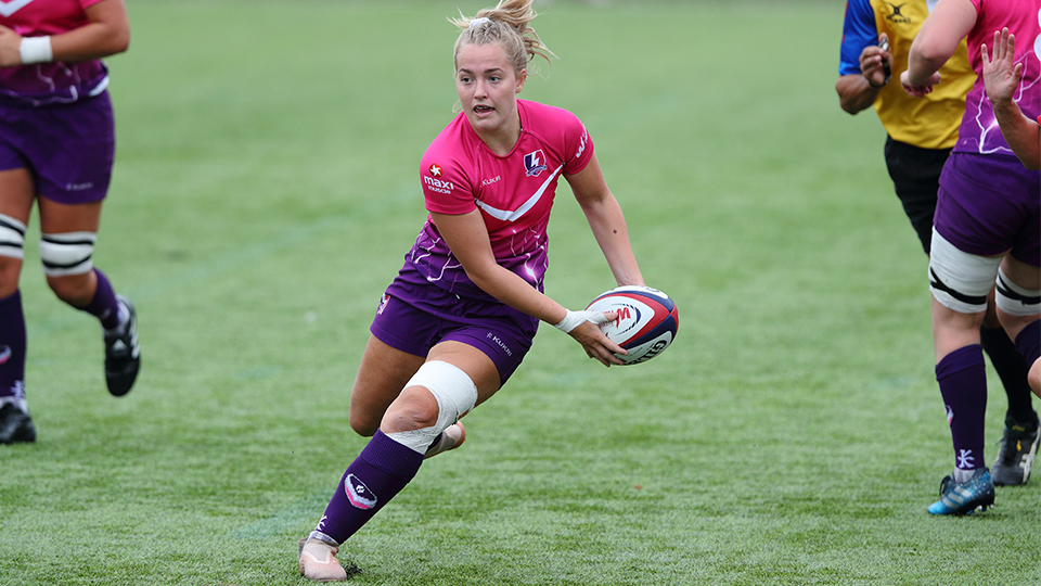 Meg Davey playing rugby