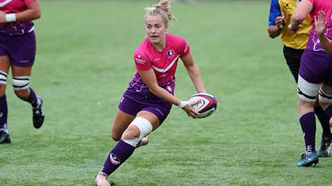 Meg Davey playing rugby