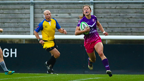 two rugby players on the pitch