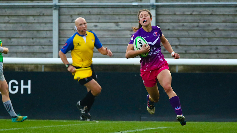 two rugby players on the pitch