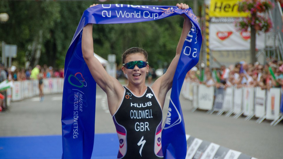 an athlete crossing the finish line