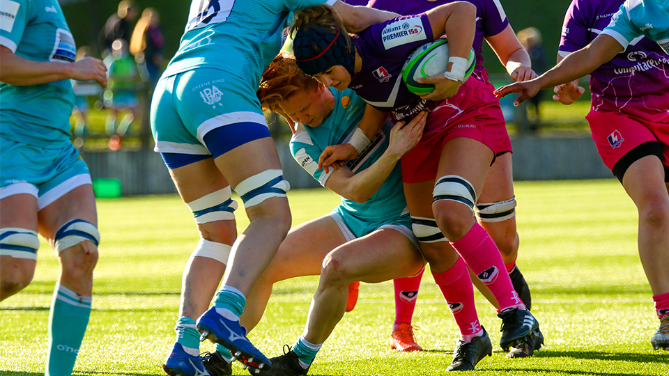 close up of rugby players on the pitch