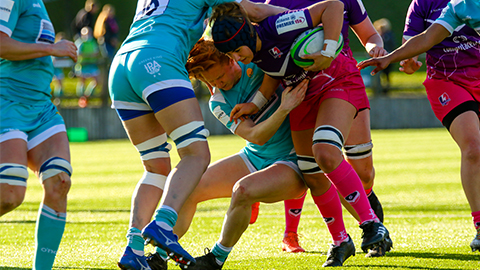 close up of rugby players on the pitch