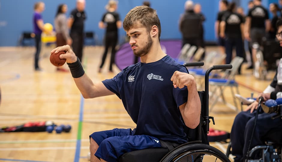 wheelchair boccia players on court