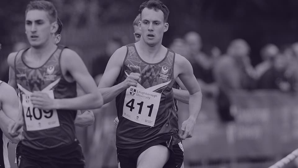 a close up of runners on a track