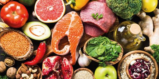 a variety of food spread out on a table