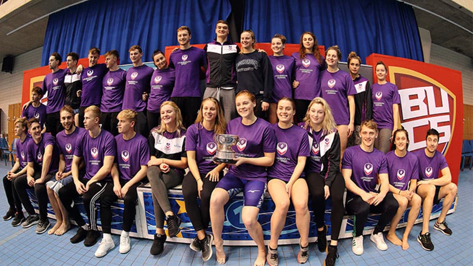 a group photo of the swimming team in 2018