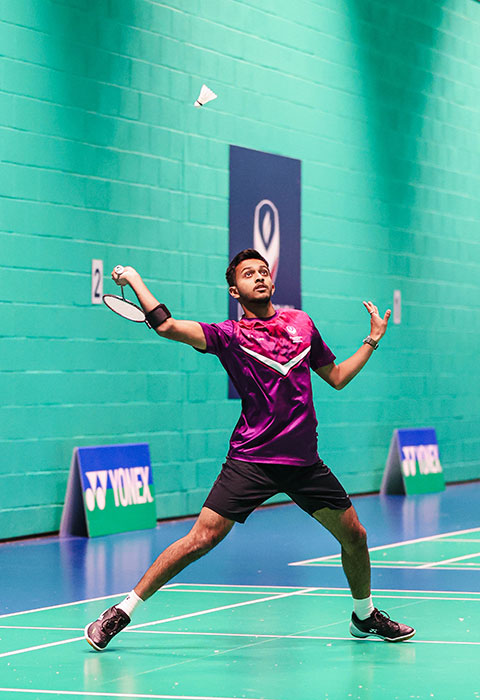 Student Puellea, playing badminton
