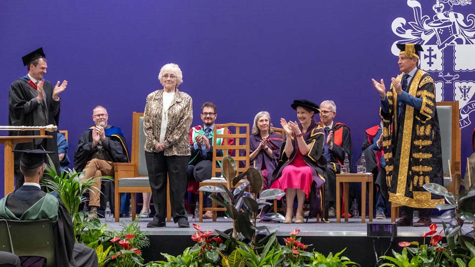 Sandra Freeman receiving her University Medal after over 50 years dedicated service.