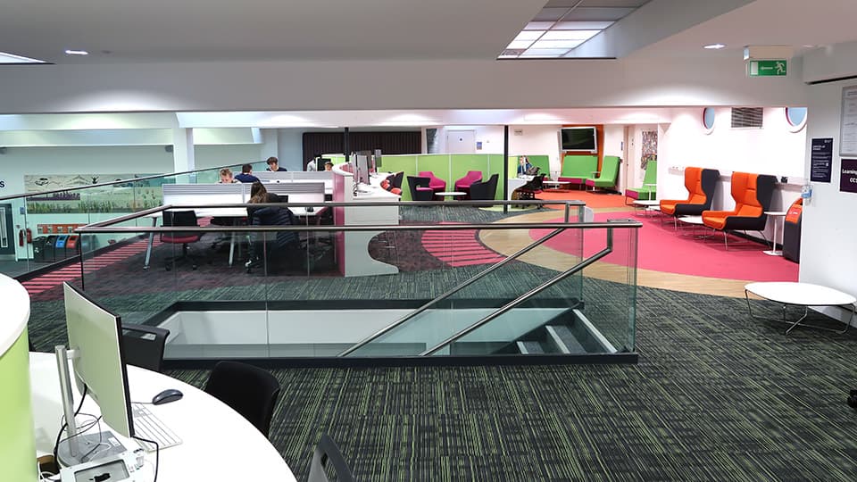 James France Mezzanine - colourful study space with multiple seating and desk options.