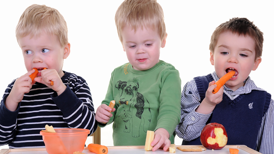 Children eating vegetables