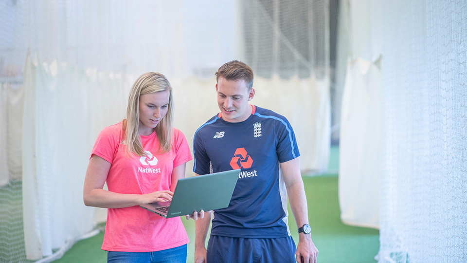 placement card, two students in cricket testing lab