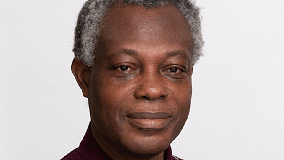 Portrait photo of an academic, Francis Edum-Fotwe, on a white background