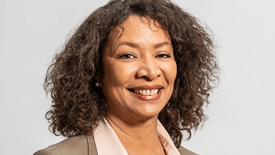 Portrait photo of an academic, Patricia Carrillo, on a white background