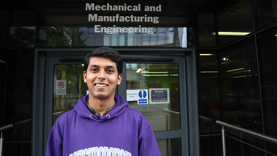 Mechanical Engineering MSc student Rohit, smiling headshot standing outside of the Wolfson School. 