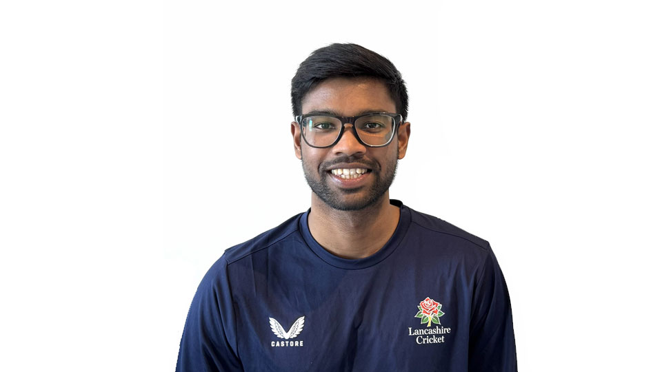 A student smiling to camera