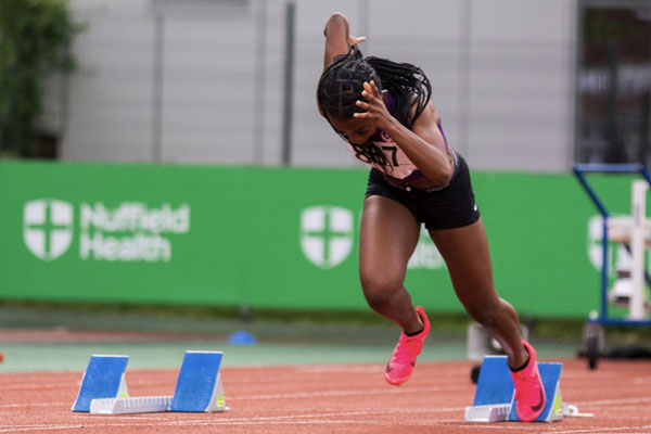 Esther leaving the starting blocks during a race