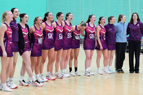 Lucie (fourth from left) captaining Loughborough’s BUCS Netball team
