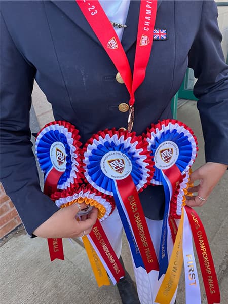 Mona with her BUCS National Equestrian Championship awards.