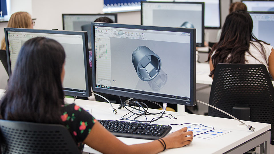 Skills in a box. A student using 3D modelling software.