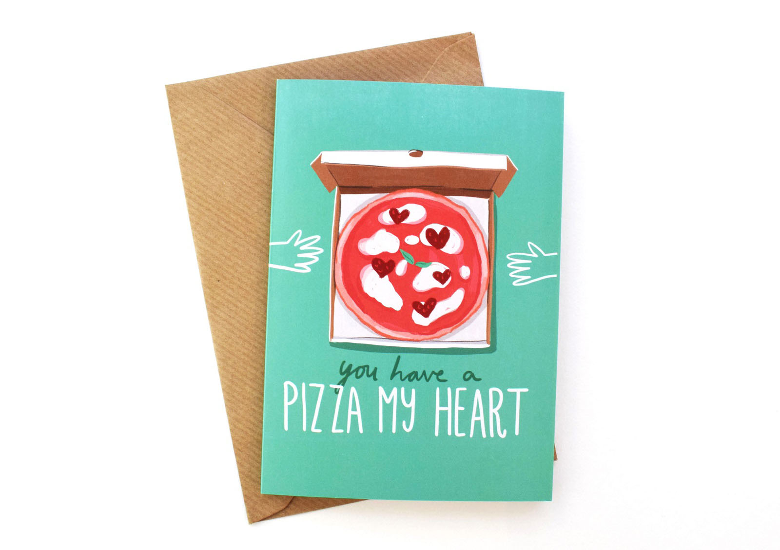 A card designed by Lauren which reads 'You have a pizza my heart' with an illustration of a pizza with love hearts on the top. 