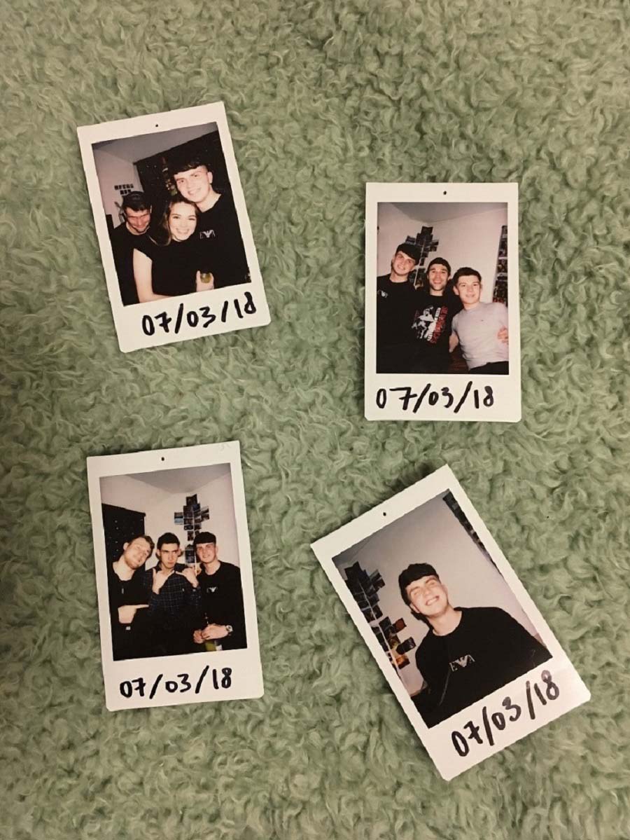 Polaroid pictures of Dan and his friends with 17/03/2018 written at the bottom of the four pictures. 