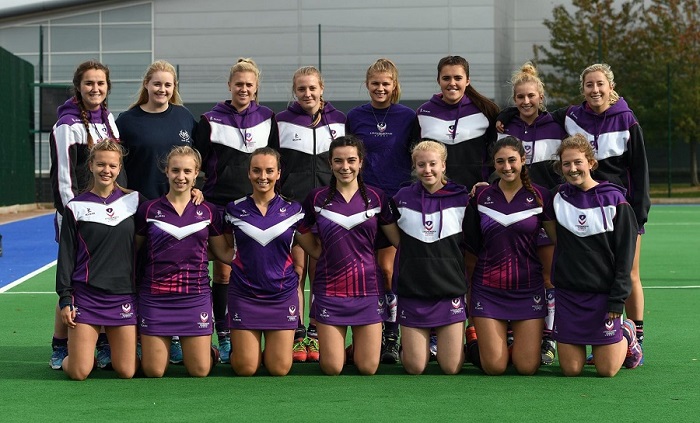 Chloe and her hockey team at their home pitch. 