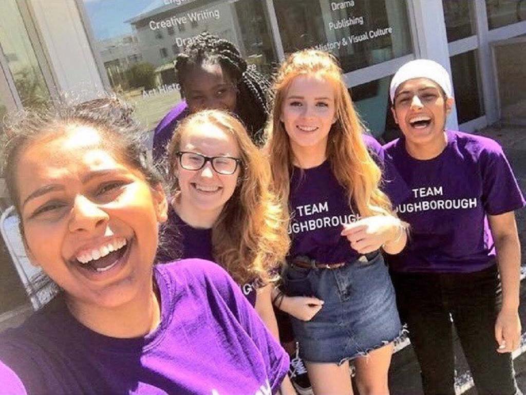 A selfie of Gugundeep and four other student ambassadors in Team Loughborough purple tops. 