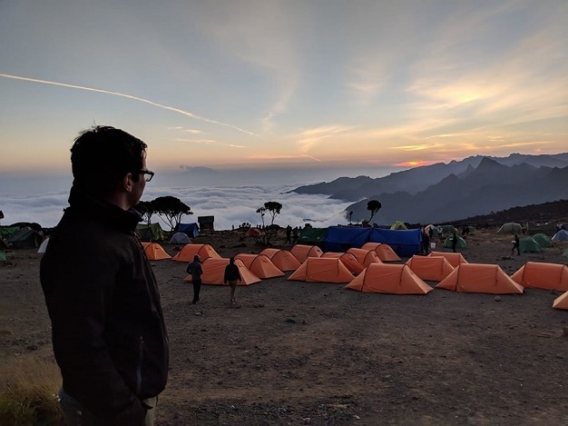 David watching the sunset over camp at Kilimanjaro.  