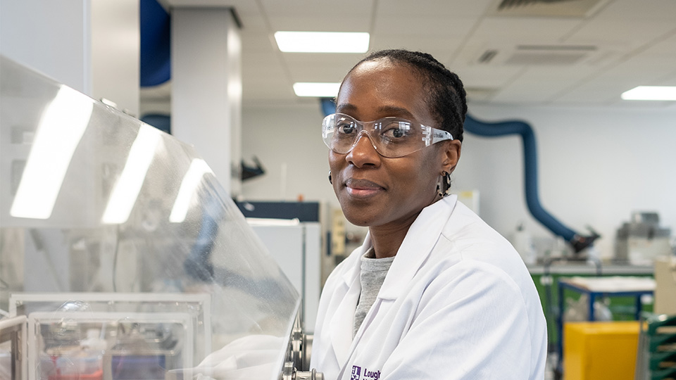 Mickella Dawkins working in a lab