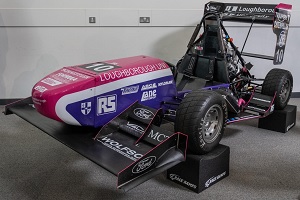 A picture showing Loughborough University students' 2019 entry for the annual Formula Student competition.
