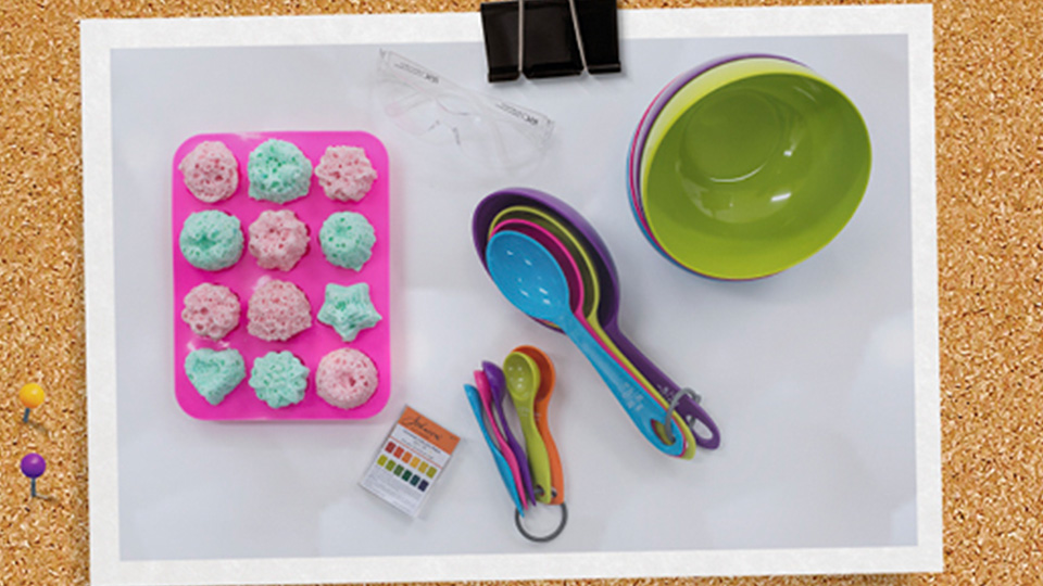photo of cakes and baking equipment clipped to a notice board