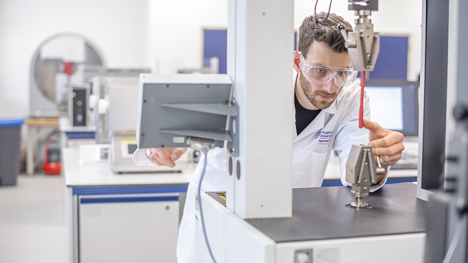 Oscar working in lab