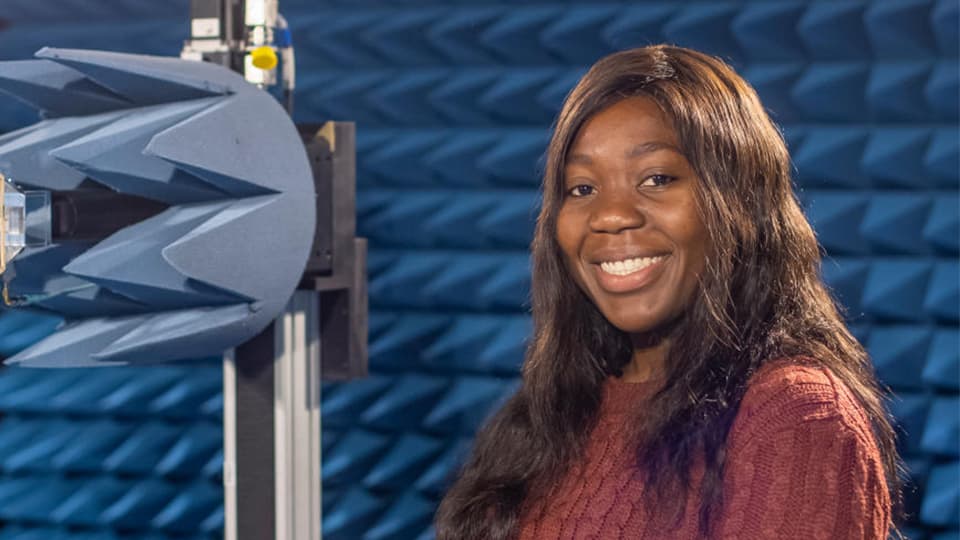 Student in anechoic chamber