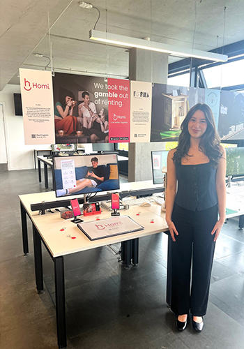 Zoe standing in front of her final year project.