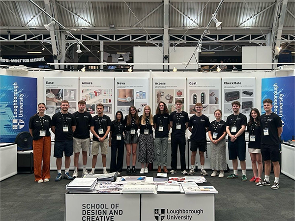 Zoe standing outside the New Designers exhibition and with fellow Loughborough University students at the Loughborough University stand.