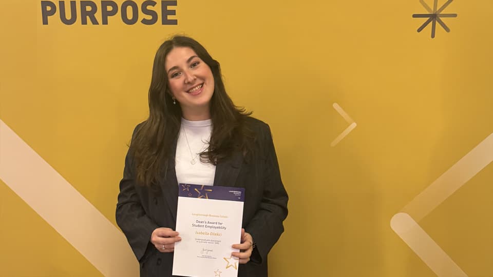 Isabella Dilekci receives her Dean's Award for Employability.