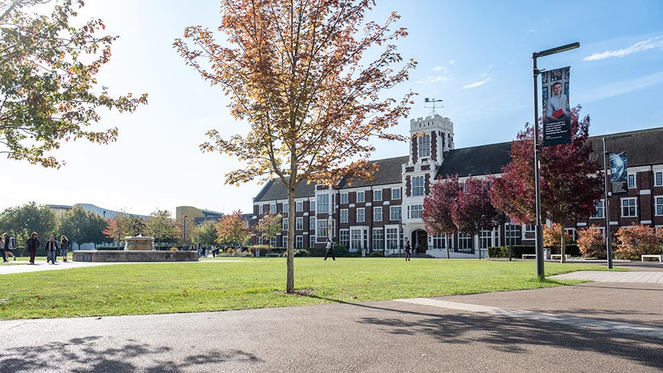 A view of Hazlerigg building on campus on a sunny day