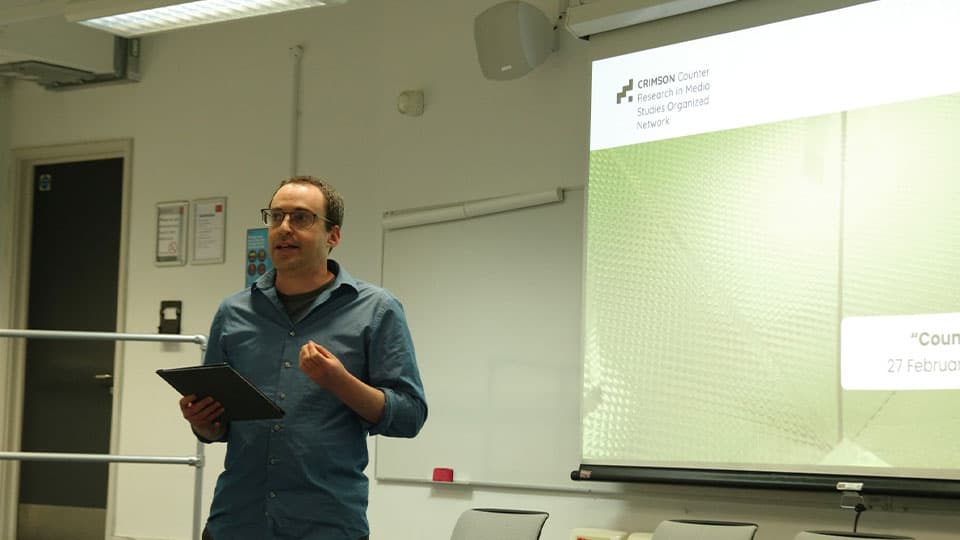 Dr Yuval Katz speaking at the symposium