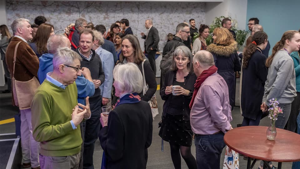 Geography members of staff at an event in the Morag Bell building
