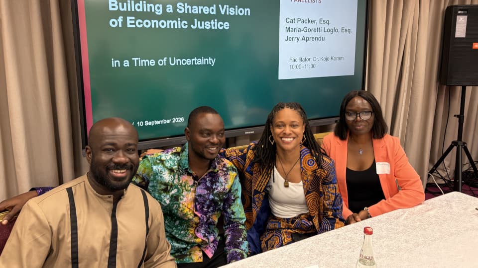 Kojo Koram and other panel participants at a conference