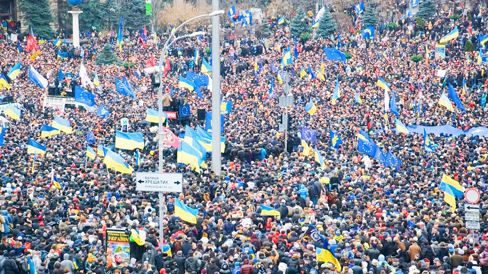 A large crowd peacefully protesting the war in Ukraine