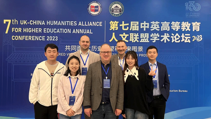 a group of academics and researchers at a conference in China