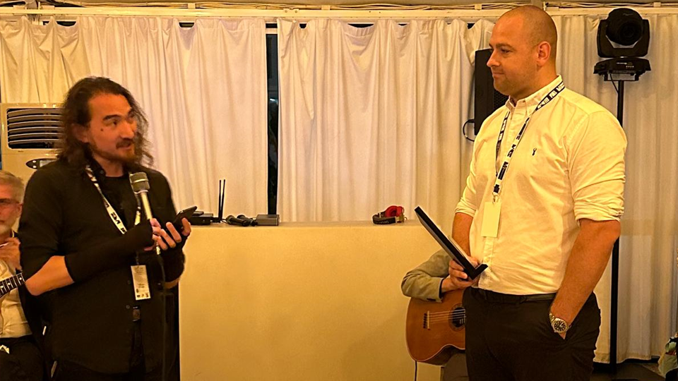 Dom Willmott recives the European Scientific Impact Award