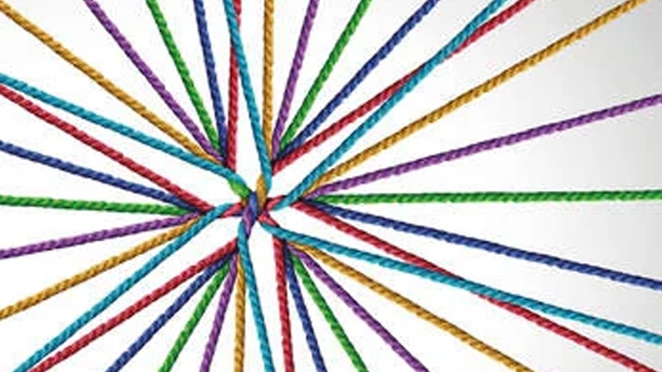 multicolored strings tied together in a central knot