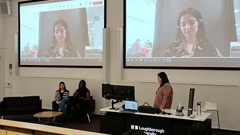Inspiring Minds session on 4 April in a lecture hall at Loughborough University.  There are two panellists, one on screen on a Teams call and the other sitting on a chair in front.