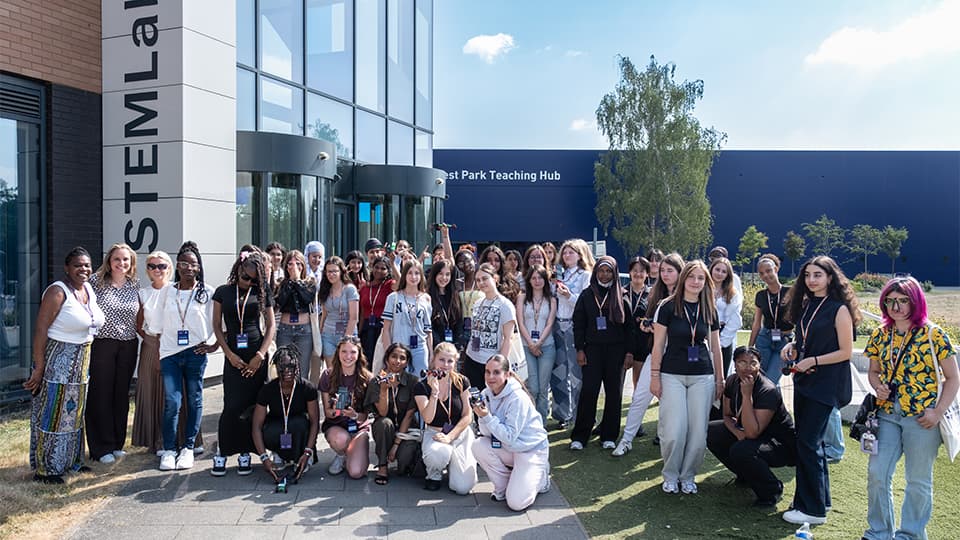 A group of Year 10 students in front of a building